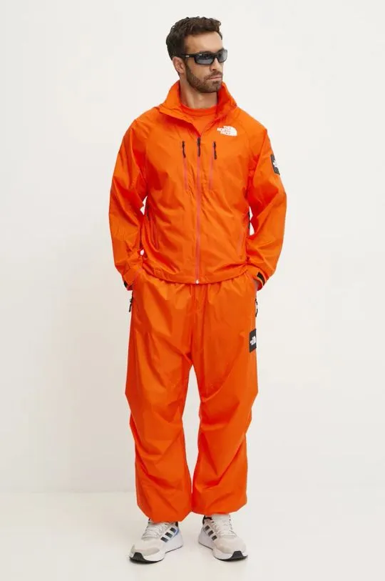 The North Face trousers TNF x Yinka Ilori orange color with an application NF0A89GPA6M1